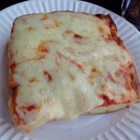 Sicilian Pizza Slice · Fresh Sicilian slice, add as many toppings as you'd like!