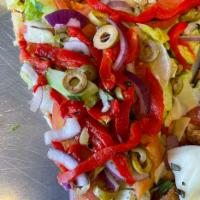 Salad Pizza Slice · House salad on pizza! (No cheese) Served with housemade Italian dressing on the side. 