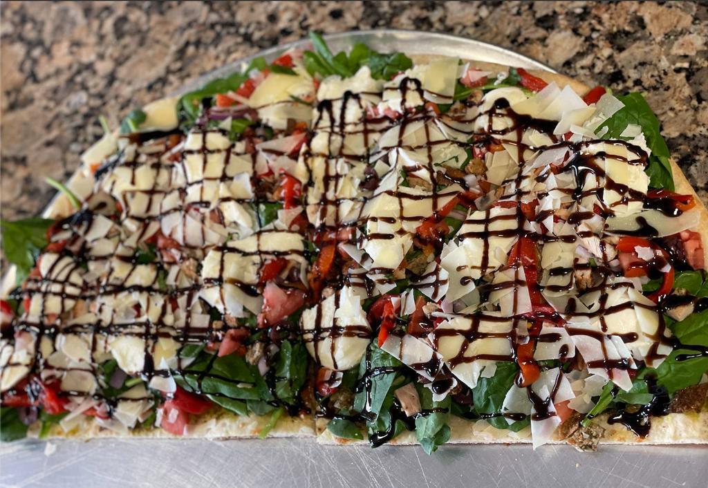Bella Pizza · Fresh Spinach, grilled chicken, eggplant, roasted peppers, red onions, tomato, fresh mozzarella, Kalamata olives with a balsamic glaze on top. 