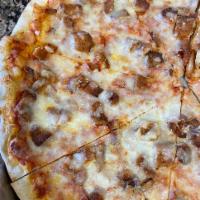 Chicken Parmigiana Pizza · Chicken cutlet, marinara sauce and cheese.