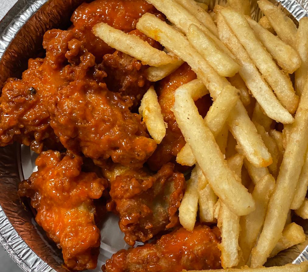 Chicken Wings with French Fries · Fried chicken wings. Choose Spicy, BBQ, or plain. Served with French fries.