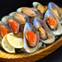 Crazy Mussel · Steamed mussel in special house garlic sauce.