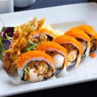 Spider Roll · In: imitation crab, soft shell crab, avocado and gobo. Out: masago and eel sauce.