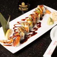 9. Ocean Roll · 8 pieces. Soft shell crab, mango with shrimp, avocado and eel on top.