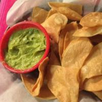 Guacamole and Chips · Homemade fresh guacamole: jalapenos, onions, cilantro, tomato, and fresh lime served with to...