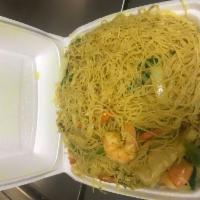 C11. Singapore Noodle · Chicken and shrimp with shredded vegetables mixd with thin rice noodles in hot spicy curry f...
