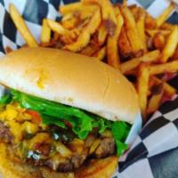 #7. Project X and Fries · Tabasco sauce cooked in to the meat, grilled onions and jalapenos topped off with cheddar ch...