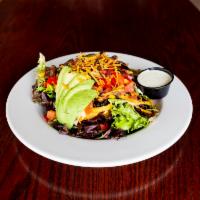 Southwest Salad · Peppers, tomato, avocado, black bean corn salsa, cheese, tortilla strips, cilantro ranch.