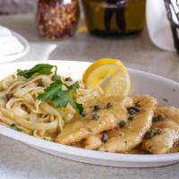 Chicken Limone · Chicken tenders sauteed with lemon juice, capers, white wine, and garlic served with fettucc...