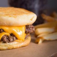 Cheeeesy Burger · We encourage to pronounce all four E’s when ordering. Four slices of melted American cheese ...