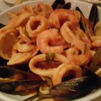 Seafood Linguini · Clams, mussels, calamari and shrimp, white or red sauce.