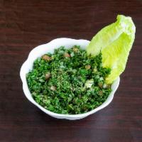 Tabbouleh Dinner Salad · Chopped parsley, scallions, diced tomatoes, lemon juice, olive oil, cracked wheat and spices.