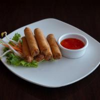 7. Six Piece Egg Roll · Ground pork, cabbage, transparent noodles, carrots, white and green onions and cilantro in a...