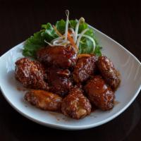 9. Eight Piece Winglettes · Deep fried wingettes and drumettes tossed in a sweet Thai chili sauce.