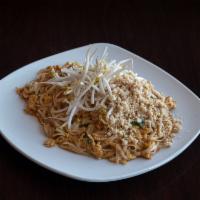 40. Curry Noodle · Sauteed rice noodles with eggs, bean sprouts and green onions in red curry coconut milk, top...