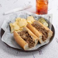 Our Famous Brisket cheese steak · Your choice of cheese, includes sauteed, onions, sweet peppers, mushrooms.