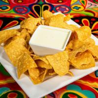 Queso Bowl  · A big 8oz. bowl of our signature white cheese dip and chips. Homemade, zesty, and delicious.
