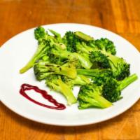 Broccoli Bites  · Fresh broccoli sauteed on Olive oil, dry chili and cumin seeds.           ( Gluten free)