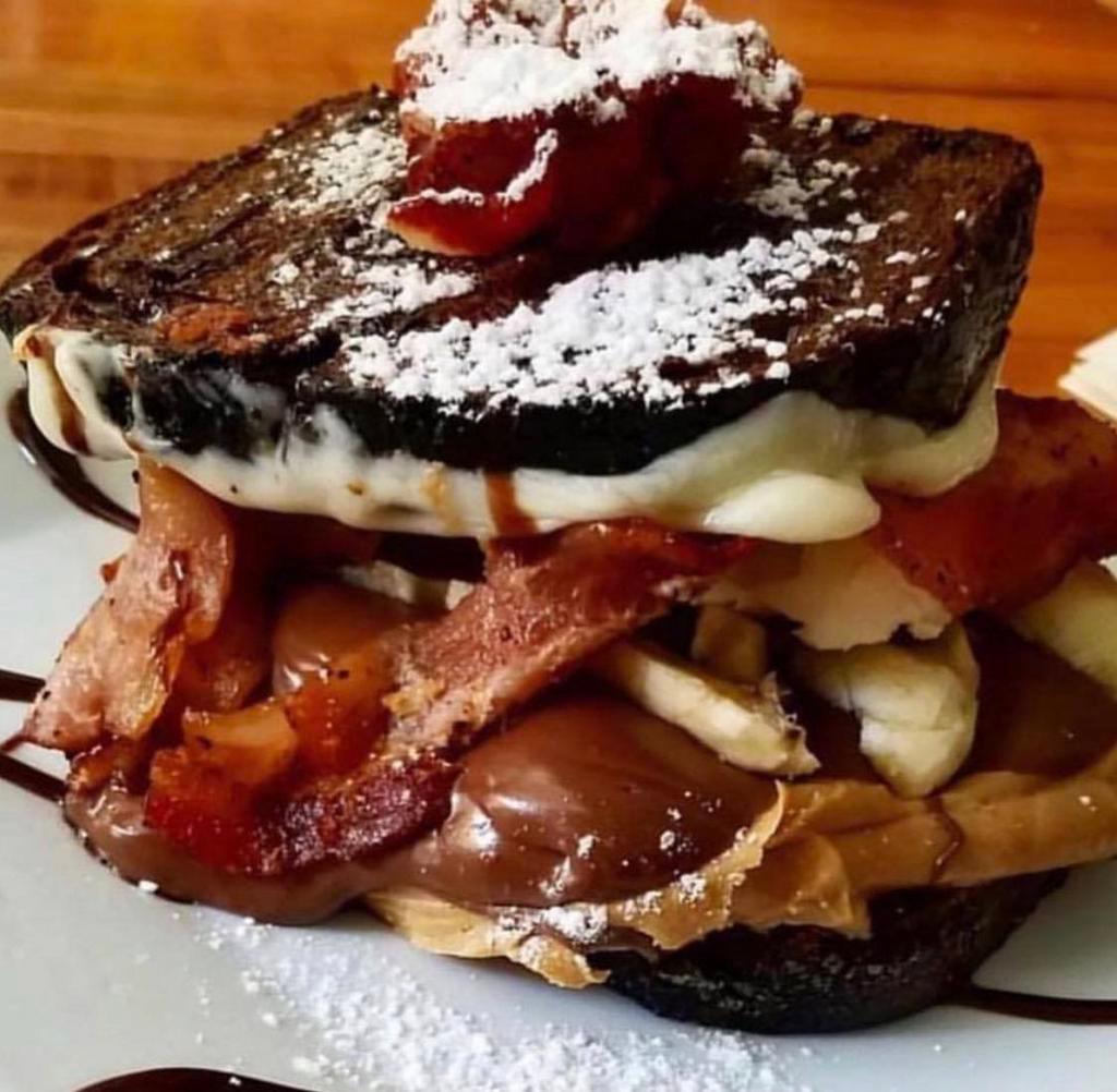 The Big 'O' Grilled Cheese · Local Chocolate Bread french toast with peanut butter, nutella, banana, applewood bacon and mascarpone. 