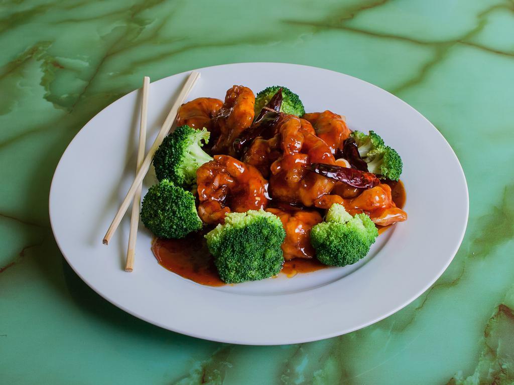 General Tso's and Sesame Specialty · Deep fried chicken, beef or shrimp sauteed with sweet and tangy sauce. Served with steamed broccoli. Hot and spicy.