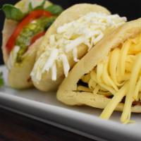 Build Your Own Arepa · Grilled corn dough patty. Choose any protein or side to build your own arepa.