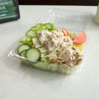 Our Specialty Tuna Salad · All-white albacore tuna made with Hellman's mayo. Lettuce, Tomato, Onion, Pickles.