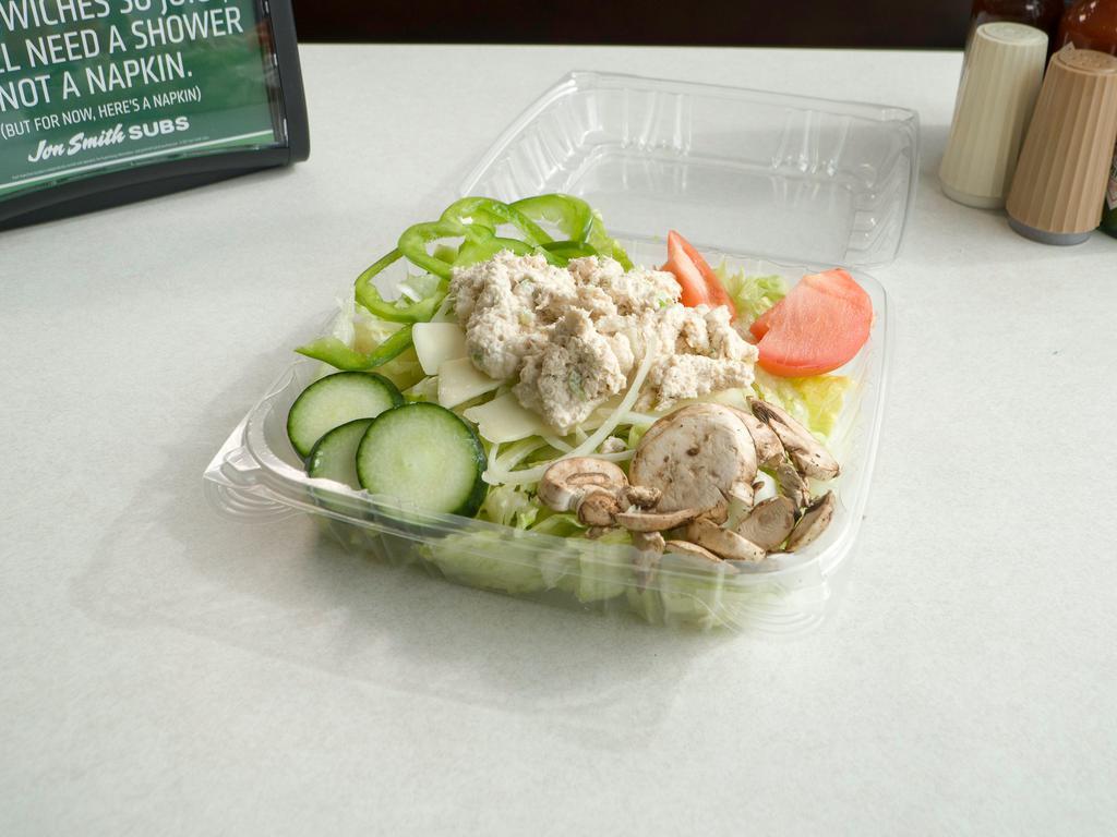 Our Specialty Tuna Salad · All-white albacore tuna made with Hellman's mayo. Lettuce, Tomato, Onion, Pickles.