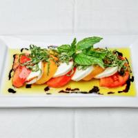 Caprese Salad · Mozzarella and tomatoes.