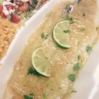 Tilapia in Butter Garlic · Fresh seasoned tilapia fillet grilled in a creamy butter garlic sauce. Served with rice and ...