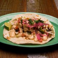 Diego’s Fish Taco · Grilled or fried tilapia, Creole slaw, pickled red onion, pico de gallo, cilantro and topped...