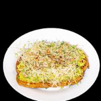 Shayna’s Avocado Toast · Mashed avocado on multigrain with sprouts, sea salt, cracked black pepper, olive oil and a w...