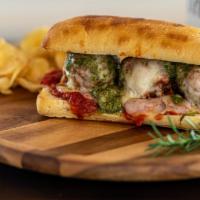 Papa Joe's Meatball Sandwich · Meatballs with just the right amount of marinara sauce, melted provolone and basil pesto on ...