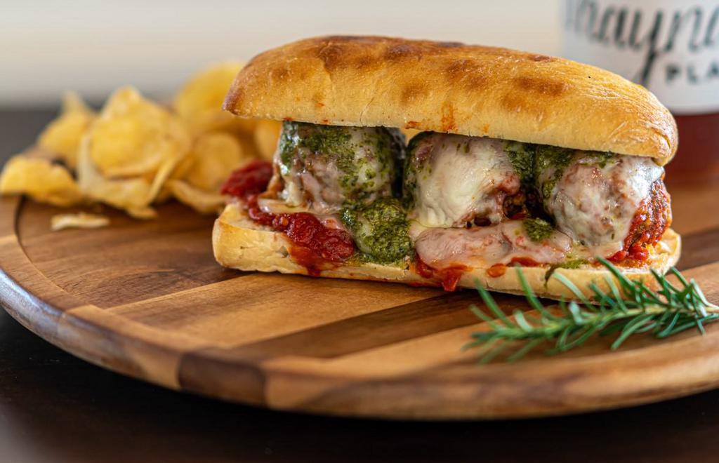 Papa Joe's Meatball Sandwich · Meatballs with just the right amount of marinara sauce, melted provolone and basil pesto on hoagie.