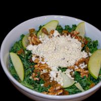 Sweet Baby Kale Salad · Romaine, baby kale, green apple, golden raisins, walnuts, goat cheese and honey poppyseed dr...