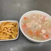 Seafood Soup · Savory soup with mixed seafood. 