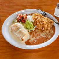 Chimichanga Dinner · Folded and fried flour tortilla stuffed with your choice of meat, covered with cheese sauce....
