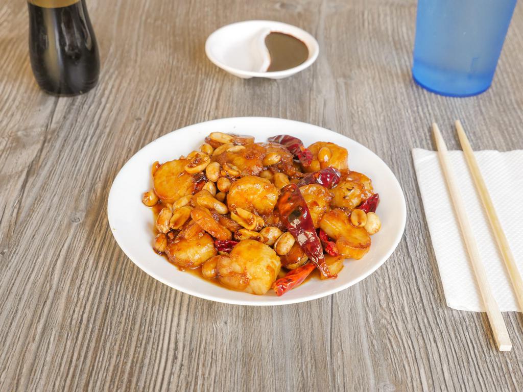 Kung Pao Seafood · Scallops, shrimp, fish fillet, dry red peppers, water chestnuts and peanuts sauteed in our hot kung pao sauce. Spicy.
