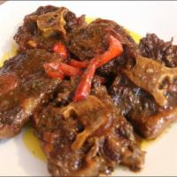 Rabo Guisado · Stewed oxtail.