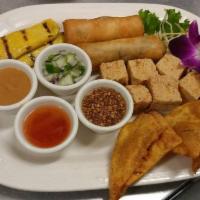 Combination Plate · Our sample platter of poh pia tod, tao hoo tod, chicken satay, and giew tod.
