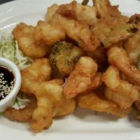 Shrimp Tempura · Lightly battered fried shrimps and mixed veggies.