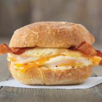 Bacon, Egg and Cheese Breakfast Sandwich · An egg breakfast sandwich that'll get you to lunch and then some. Some consider it the break...