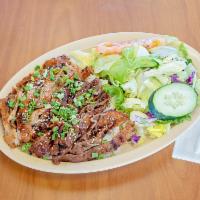 4. Beef and Chicken Plate · Comes with a choice of white or brown rice 
Green salad and a choice of ranch, thousand or I...