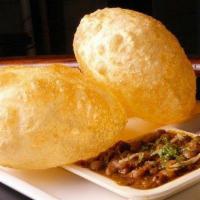 Chole Bhature · Deep fried bread served with chana masala.
