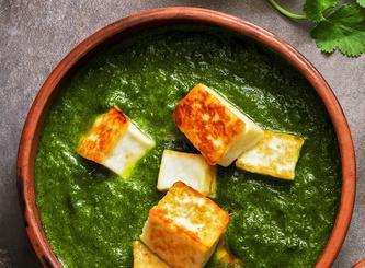 Saag Paneer · Indian Cottage Cheese (aka Paneer) simmered in homestyle spinach sauce and served with a side of Basmati Rice.