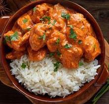 Chicken Tikka Masala · The world-famous Chicken Tikka Masala. Grilled boneless cubes of chicken simmered in velvety sauce and served with a side of Basmati Rice.