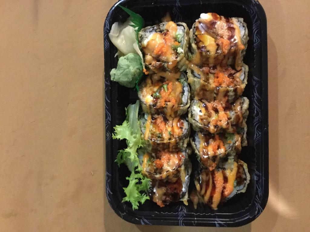 S18. Godzilla Roll · 10 pieces. Spicy tuna, avocado, cream cheese, deep fried with spicy mayo, eel sauce and masago. Raw.