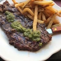 Steak and Frites · Rib eye, hand-cut fires and green chimichurri.