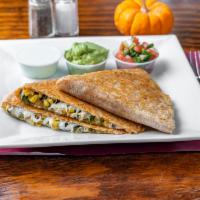 Vegetable Quesadilla · Grilled corn,poblano peppers, onions Oaxaca and cheddar cheese , served with sour cream, pic...