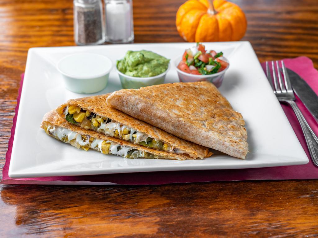 Vegetable Quesadilla · Grilled corn,poblano peppers, onions Oaxaca and cheddar cheese , served with sour cream, pico de gallo and guacamole.