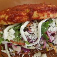 Shredded Beef Pambazo · Mexican sandwich drenched in a delicious guajillo sauce filled with cheese, refried beans, M...